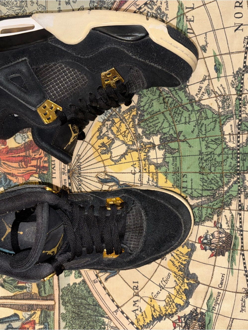 Jordan Men’s Black and Gold Retro Sneakers